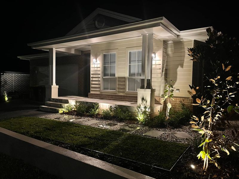 Front yard with garden lighting